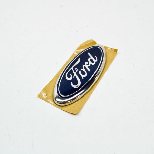 4673491 - NEW FORD TRANSIT MK3 REAR EMBLEM BADGE 4673491 3U5A-19H250-EA ORIGINAL