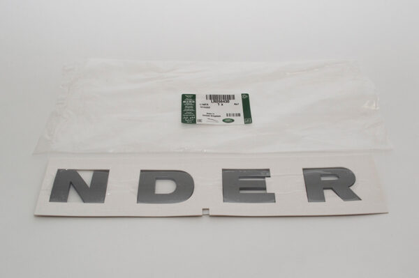 LR058430 - LAND ROVER DEFENDER L316 Front Bonnet Name Plate LR058430 ORIGINAL
