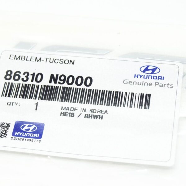 86310N9000 - Hyundai Tucson NX4 MK4 Tailgate Emblem 86310N9000, Original Part